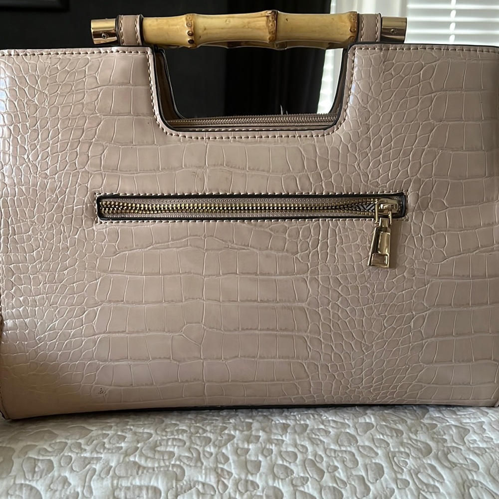 Tan pleather purse with faux bamboo handle